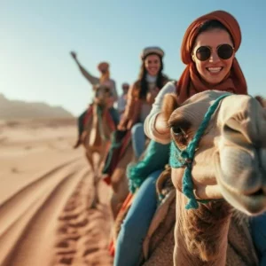 happy-tourists-enjoying-group-camel-riding-desert-travel-lifestyle-holiday-activities-concept-adventure_697211-13997